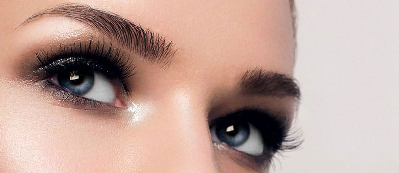 Close-up of a woman's eyes and eyebrows.